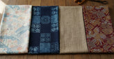 Assortiment de tissus kimono japonais en soie coton et lin sur surface en bois