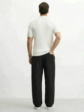 Vue arrière pantalon japonais homme Edo noir cargo avec polo blanc côtelé