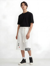 Pantalon japonais homme style hakama blanc Hayato avec ceinture nouée et motif japonais traditionnel