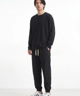 Pantalon japonais Kaito noir, pantalon decontracte homme vue de face fond blanc
