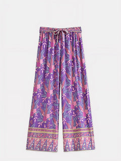 Pantalon de l’Ensemble Kimono Femme Éclat Violet – coupe fluide et ample, motifs floraux violets et roses avec ceinture à cordon et bordures décorées.