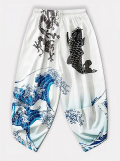 Vue arrière du pantalon harem japonais blanc Koiwave avec motif vague, carpe et dragon, style streetwear japonais