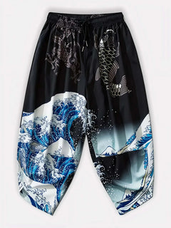 Vue avant du pantalon harem japonais noir Koiwave avec motif vague, carpe et dragon, style streetwear japonais