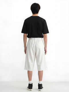 Vue de dos du pantalon japonais homme style hakama blanc Hayato avec coupe ample et taille ajustée