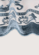 veste légère crème et bleu