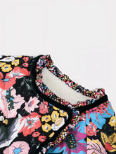 Détail du col intérieur et du bouton de la veste kimono fleurie vintage Garden Eclipse sur fond blanc